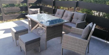 Szare meble ogrodowe technorattan ze stołem obiadowym i sofą Torino Dining