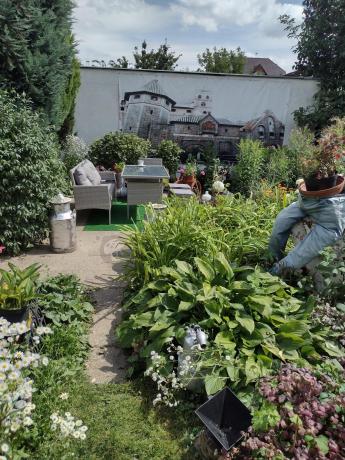 Szare meble ogrodowe technorattan ze stołem obiadowym i sofą Torino Dining
