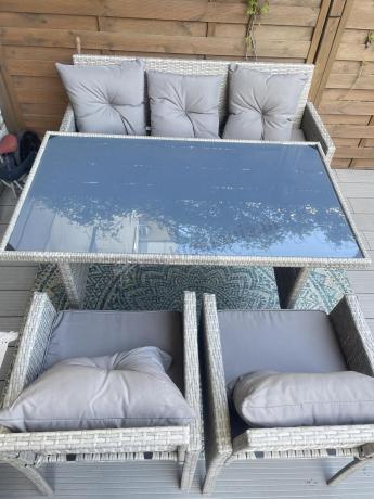 Szare meble ogrodowe technorattan ze stołem obiadowym i sofą Torino Dining