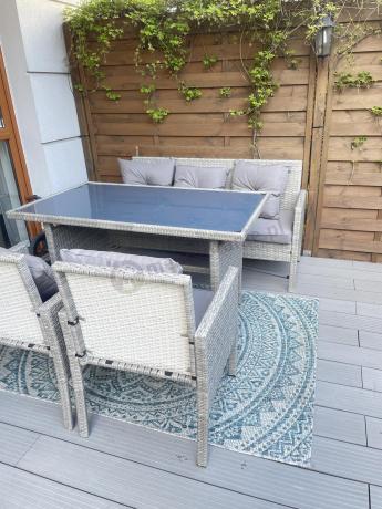 Szare meble ogrodowe technorattan ze stołem obiadowym i sofą Torino Dining