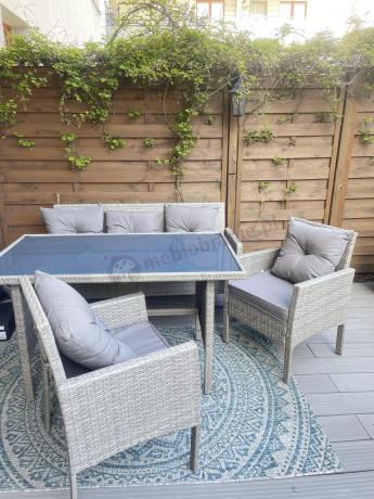 Szare meble ogrodowe technorattan ze stołem obiadowym i sofą Torino Dining