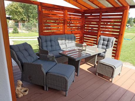 Szare meble technorattanowe na taras z regulowanymi fotelami Laritto Dining + pufy - Grey