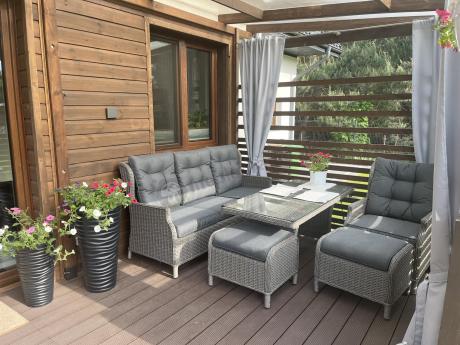 Szare meble technorattanowe na taras z regulowanymi fotelami Laritto Dining + pufy - Grey