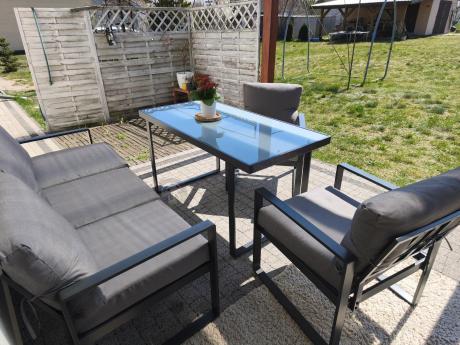 Szare nowoczesne meble na taras ze szklanym stołem - Panaon Dining Elite Grey