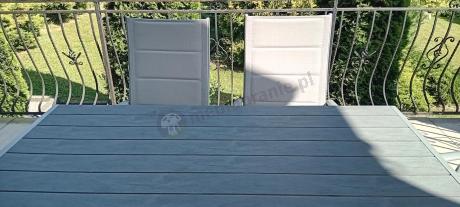 Szary komplet mebli ogrodowych ze stołem obiadowym i składanymi krzesłami - Kanbery Silver 6+1