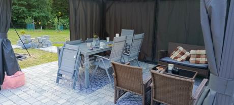 Szary komplet mebli ogrodowych ze stołem obiadowym i składanymi krzesłami - Kanbery Silver 6+1