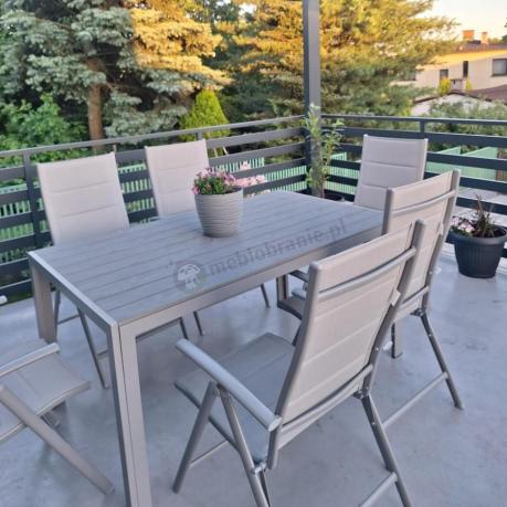 Szary komplet mebli ogrodowych ze stołem obiadowym i składanymi krzesłami - Kanbery Silver 6+1