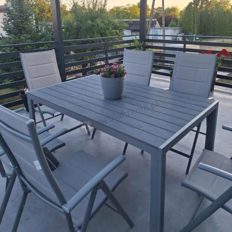 Szary komplet mebli ogrodowych ze stołem obiadowym i składanymi krzesłami - Kanbery Silver 6+1