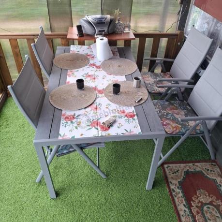 Szary komplet mebli ogrodowych ze stołem obiadowym i składanymi krzesłami - Kanbery Silver 6+1