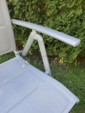 Szary komplet mebli ogrodowych ze stołem obiadowym i składanymi krzesłami - Kanbery Silver 6+1