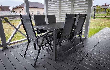 Szary komplet mebli ogrodowych ze stołem obiadowym i składanymi krzesłami - Kanbery Silver 6+1