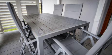 Szary komplet mebli ogrodowych ze stołem obiadowym i składanymi krzesłami - Kanbery Silver 6+1