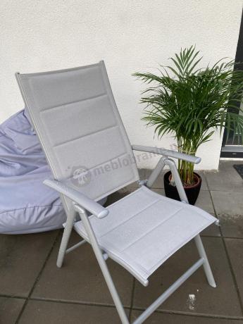 Szary komplet mebli ogrodowych ze stołem obiadowym i składanymi krzesłami - Kanbery Silver 6+1