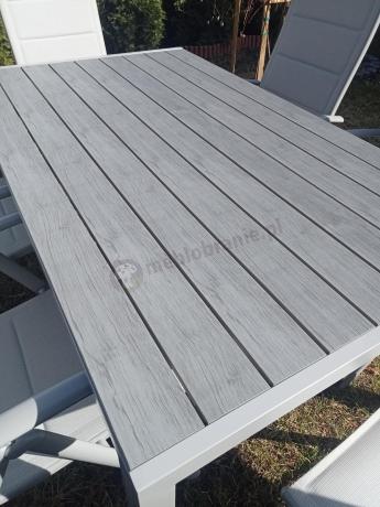 Szary komplet mebli ogrodowych ze stołem obiadowym i składanymi krzesłami - Kanbery Silver 6+1