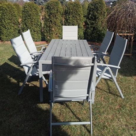 Szary komplet mebli ogrodowych ze stołem obiadowym i składanymi krzesłami - Kanbery Silver 6+1