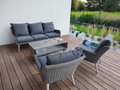 Szary komplet mebli z technorattanu dla 5 osób z sofą i fotelami Cioso