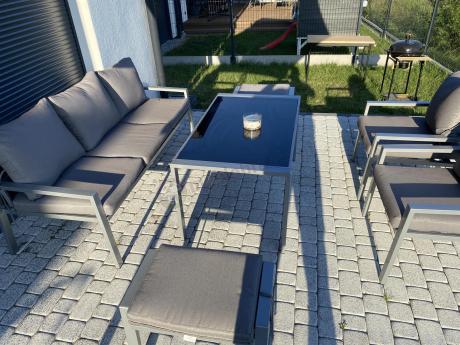 Szary komplet ogrodowy metalowy z sofą 175cm, fotelami i pufami - Sodor Max + pufy - Silver