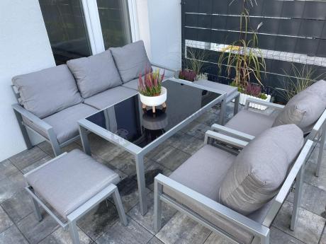 Szary komplet ogrodowy metalowy z sofą 175cm, fotelami i pufami - Sodor Max + pufy - Silver