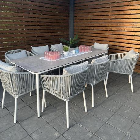 Szary narożnik na taras dla 8 osób z fotelem i pufami Postigo Corner XL