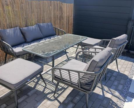 Szary zestaw rattanowy dla 7 osób na taras Torgiano Dining