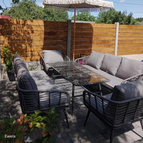 Szary zestaw rattanowy dla 8 osób na taras Torgiano Grande