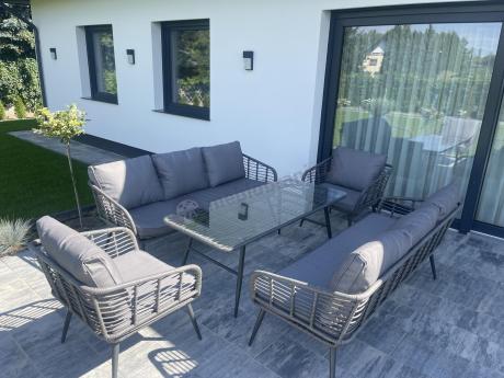 Szary zestaw rattanowy dla 8 osób na taras Torgiano Grande