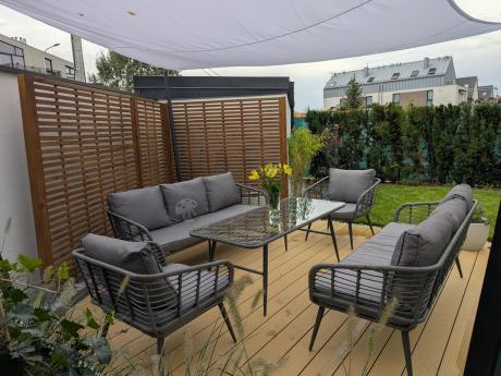 Szary zestaw rattanowy dla 8 osób na taras Torgiano Grande