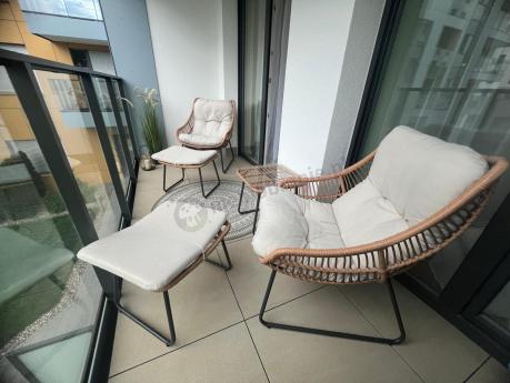 Technorattanowe meble na taras w stylu boho - 2 fotele z podnóżkami - Torgiano Duo - Brown