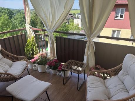 Technorattanowe meble na taras w stylu boho - 2 fotele z podnóżkami - Torgiano Duo - Brown