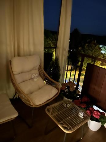 Technorattanowe meble na taras w stylu boho - 2 fotele z podnóżkami - Torgiano Duo - Brown