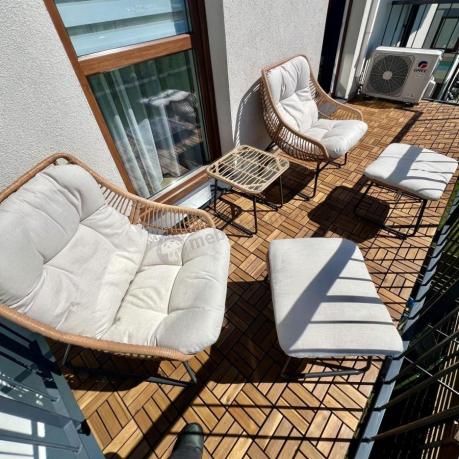 Technorattanowe meble na taras w stylu boho - 2 fotele z podnóżkami - Torgiano Duo - Brown