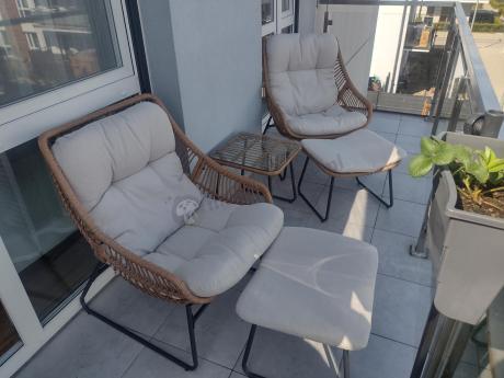 Technorattanowe meble na taras w stylu boho - 2 fotele z podnóżkami - Torgiano Duo - Brown