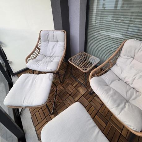 Technorattanowe meble na taras w stylu boho - 2 fotele z podnóżkami - Torgiano Duo - Brown