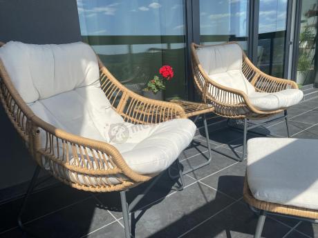 Technorattanowe meble na taras w stylu boho - 2 fotele z podnóżkami - Torgiano Duo - Brown