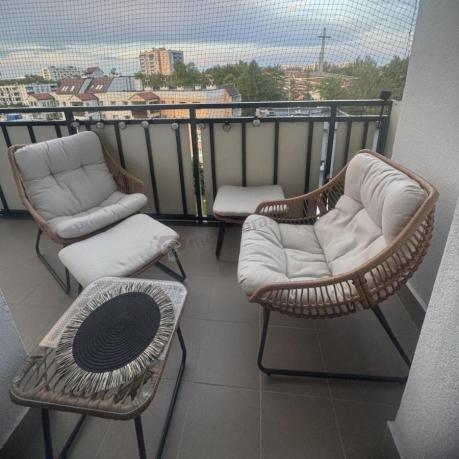 Technorattanowe meble na taras w stylu boho - 2 fotele z podnóżkami - Torgiano Duo - Brown