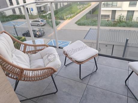 Technorattanowe meble na taras w stylu boho - 2 fotele z podnóżkami - Torgiano Duo - Brown