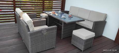 Technorattanowy komplet mebli z wysokim stołem, sofą 186cm, fotelami i pufami Cofete Dining – Brown