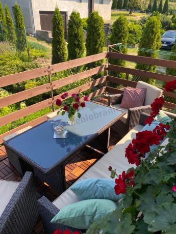 Technorattanowy komplet mebli z wysokim stołem, sofą 186cm, fotelami i pufami Cofete Dining – Brown