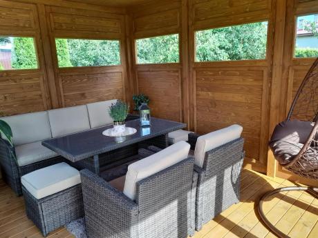 Technorattanowy komplet mebli z wysokim stołem, sofą 186cm, fotelami i pufami Cofete Dining – Brown