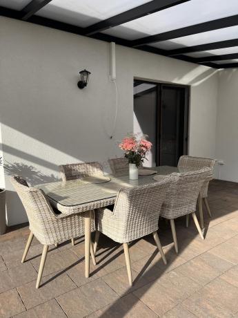 Technorattanowy zestaw ogrodowy ze stołem i 8 fotelami Tonitto Dining - Creme