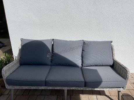 Wypoczynkowe meble z technorattanu z sofą i fotelami Cioso Creme