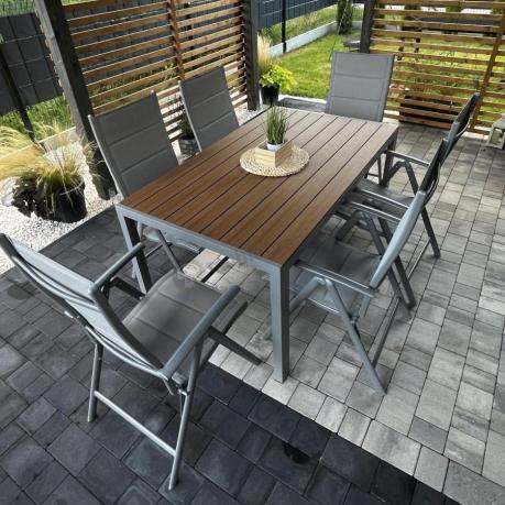 Zestaw mebli na taras ze stołem obiadowym i składanymi krzesłami - Kanbery Wood Silver 6+1