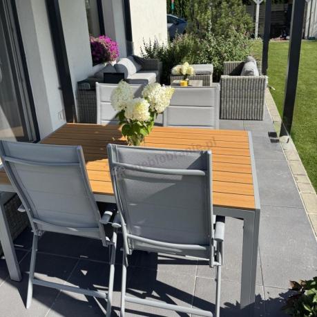 Zestaw mebli na taras ze stołem obiadowym i składanymi krzesłami - Kanbery Wood Silver 6+1