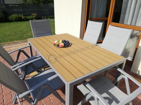 Zestaw mebli na taras ze stołem obiadowym i składanymi krzesłami - Kanbery Wood Silver 6+1