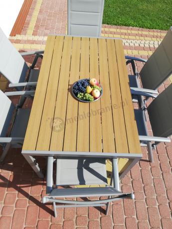 Zestaw mebli na taras ze stołem obiadowym i składanymi krzesłami - Kanbery Wood Silver 6+1