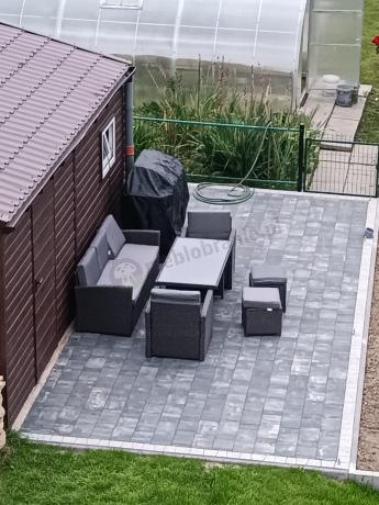 Zestaw mebli z sofą 186cm, wysokim stołem, fotelami i pufami Cofete Dining – Anthracite