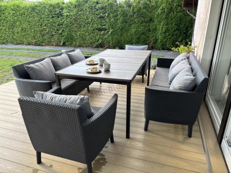 Zestaw ogrodowy 8 osobowy z dużym stołem 200 cm w kolorze drewna Meblobranie SFM Plus grafit + poduszki oparciowe