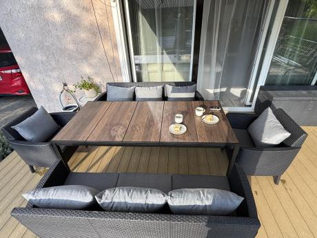 Zestaw ogrodowy 8 osobowy z dużym stołem 200 cm w kolorze drewna Meblobranie SFM Plus grafit + poduszki oparciowe