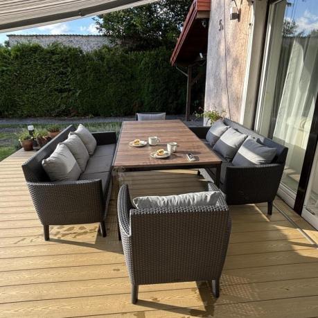 Zestaw ogrodowy 8 osobowy z dużym stołem 200 cm w kolorze drewna Meblobranie SFM Plus grafit + poduszki oparciowe