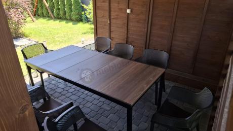 Zestaw ogrodowy Portis dla 8 osób ze stołem 200cm w kolorze orzecha i fotelami